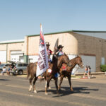 City of Abernathy parade with two horses and riders