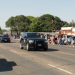 City of Abernathy July 4th parade with a police car